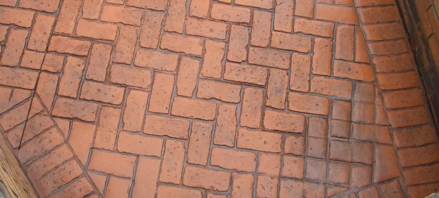 Pattern imprinted concrete by PICS in brick design, perfect for durable, stylish outdoor surfaces.