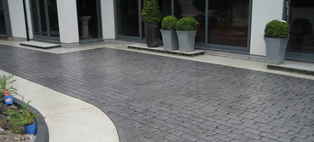 Pattern imprinted concrete driveway by PICS, specialist suppliers in decorative concrete solutions.
