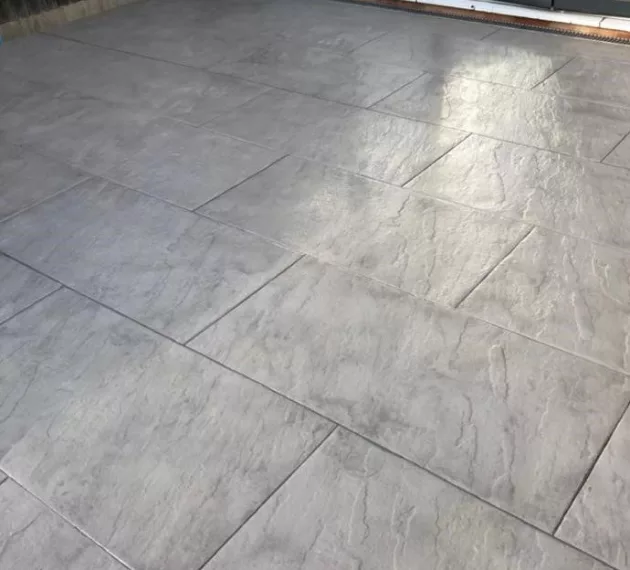 Pattern imprinted concrete driveway by PICS, high-quality concrete supplies.