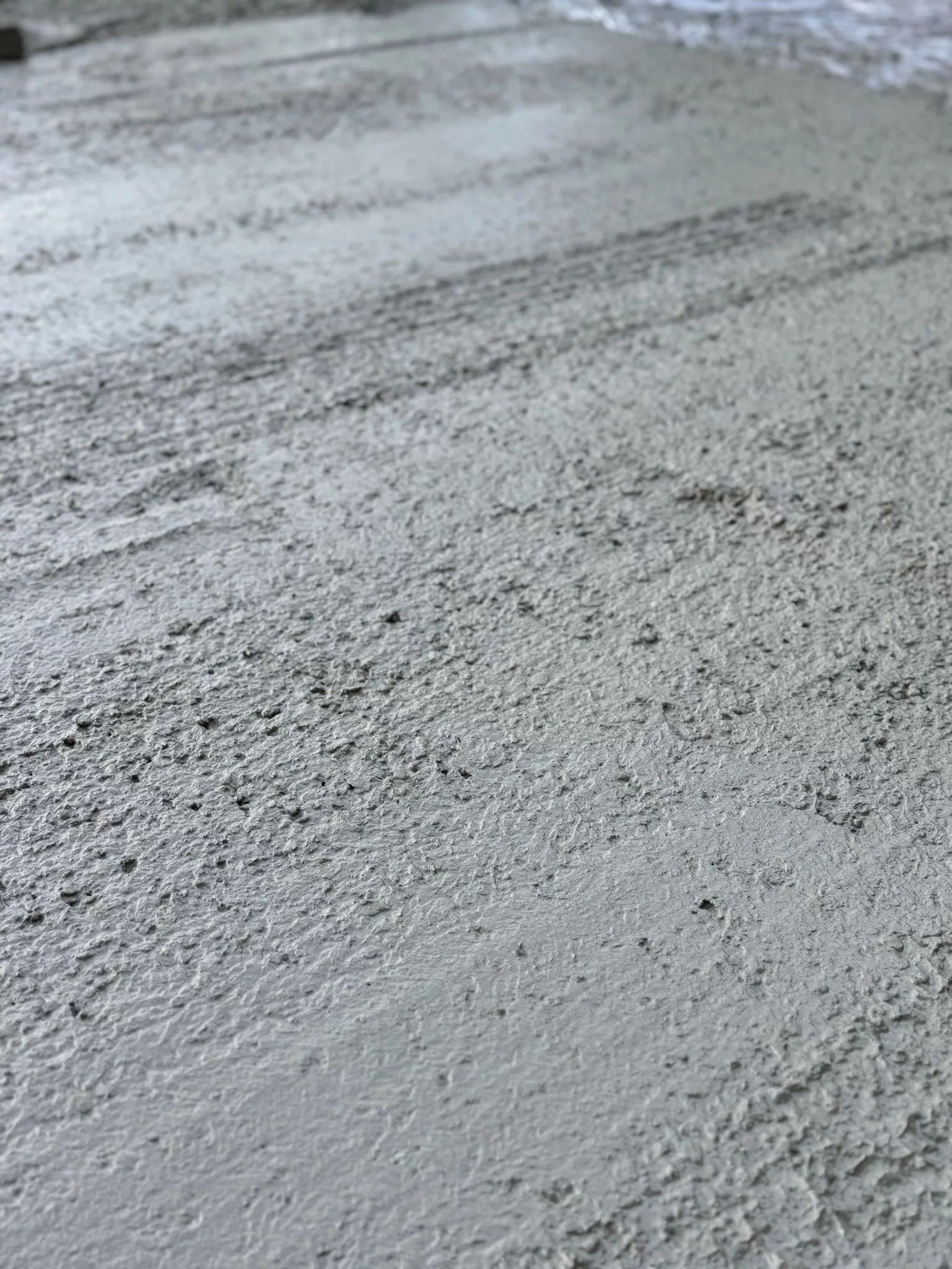 Pattern imprinted concrete by PICS for durable surfaces.