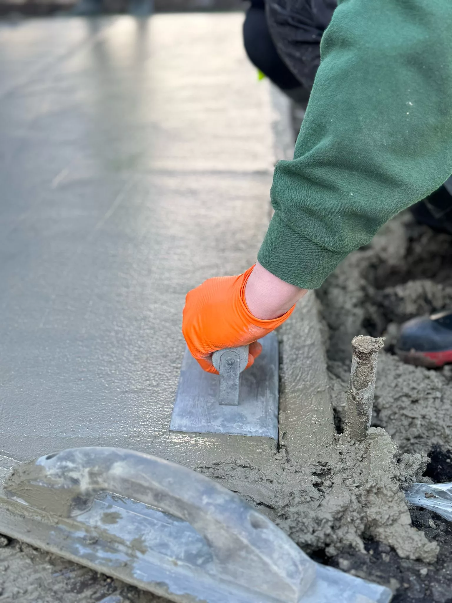 PICS pattern imprinted concrete application in progress, highlighting precision and quality craftsmanship.